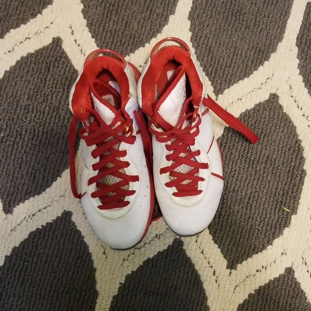 White and red basketball shoes